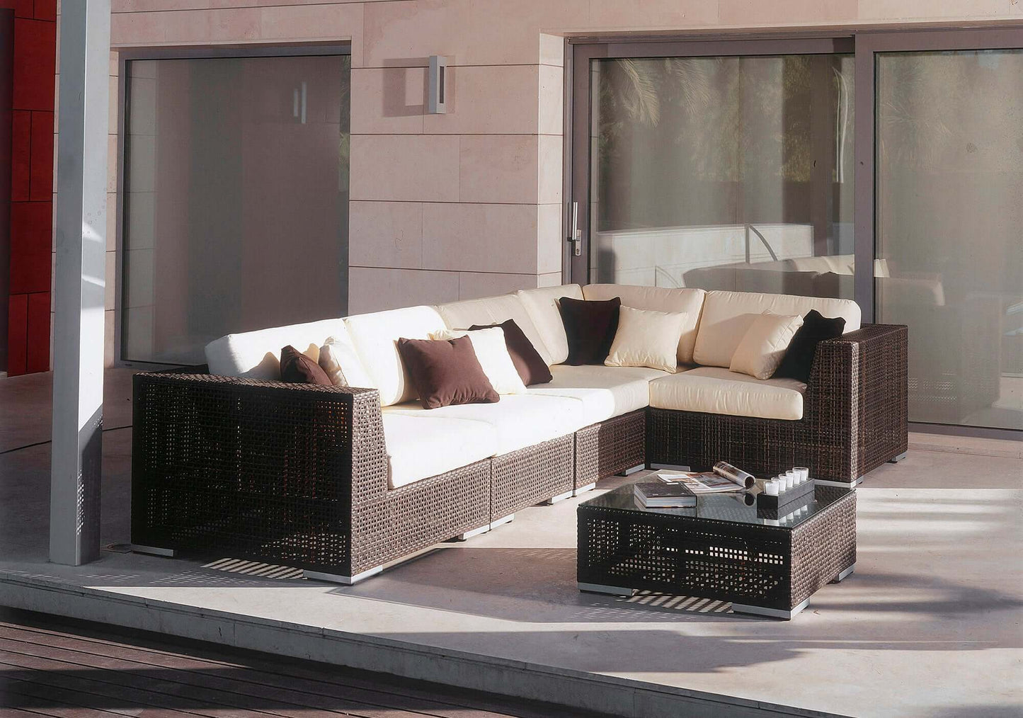 6-piece modular outdoor seating set made from anodized aluminum frame woven with Rehau Java Brown fiber
