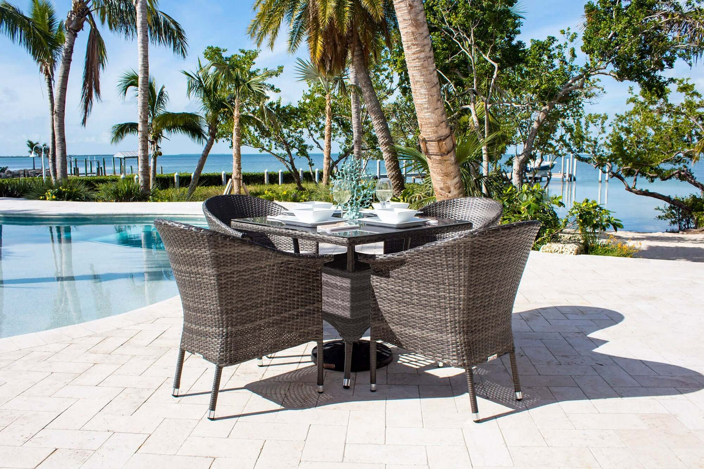 5-piece outdoor armchair dining set with cushions made with HDPE synthetic wicker