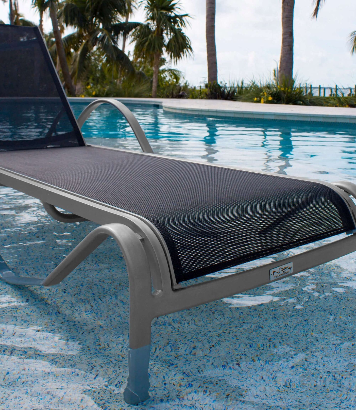 All weather proof chaise lounge with cushion made with HDPE synthetic wicker