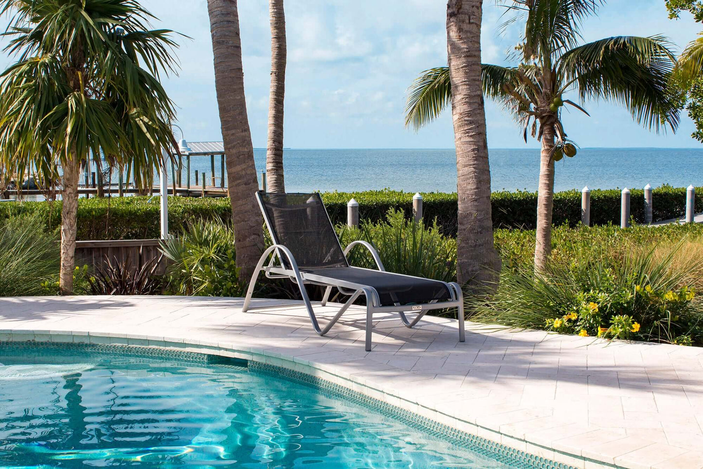 All weather proof chaise lounge with cushion made with HDPE synthetic wicker