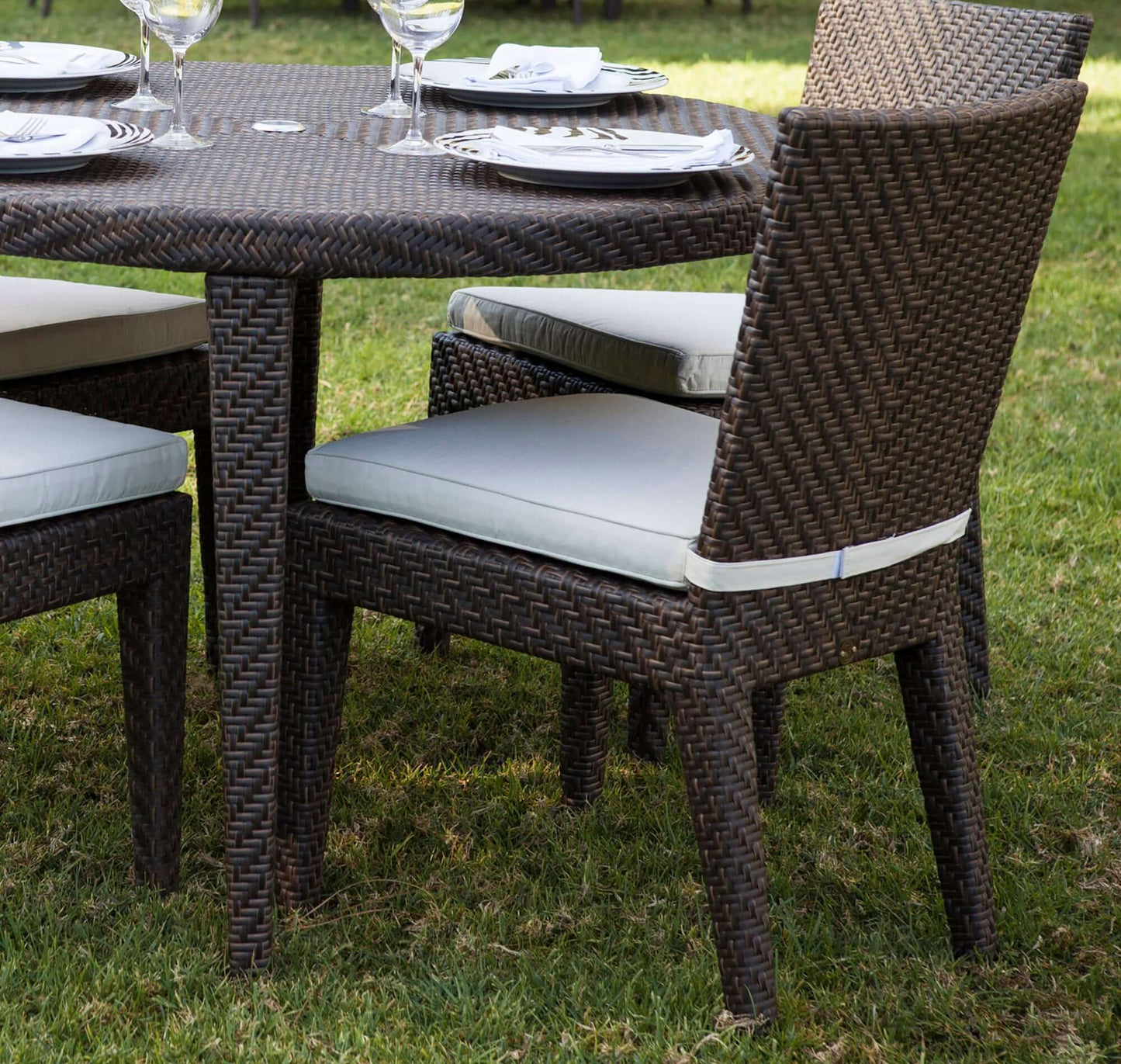 Outdoor stackable side chair with cushion