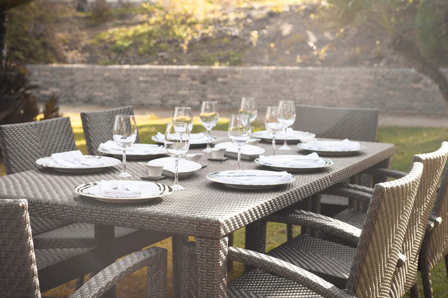 Contemporary 9-Piece Outdoor Wicker Dining Set with Glass