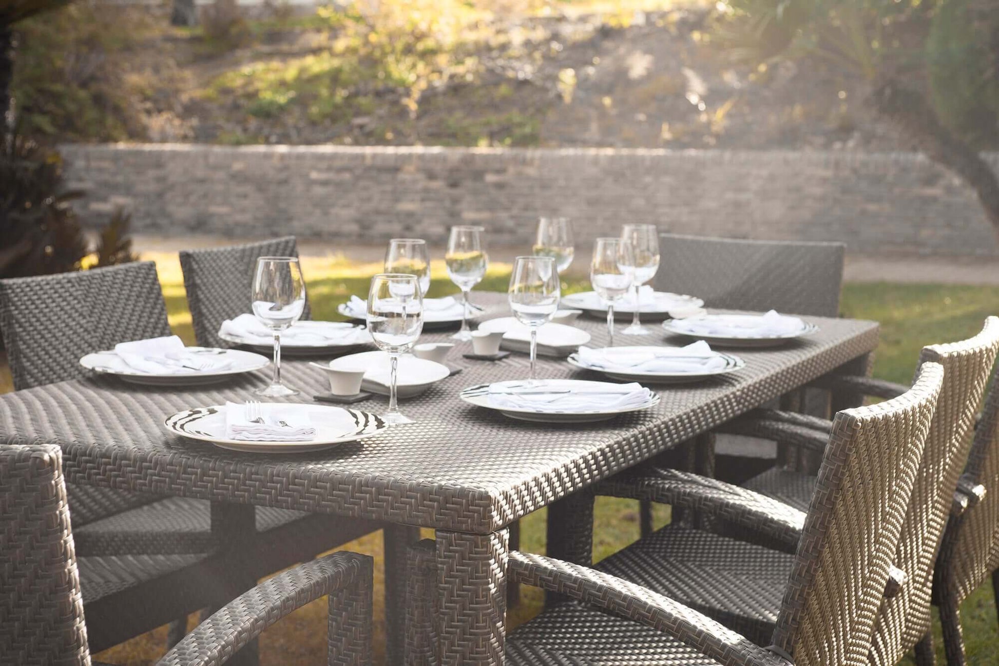 Contemporary 9-Piece Outdoor Wicker Dining Set with Glass