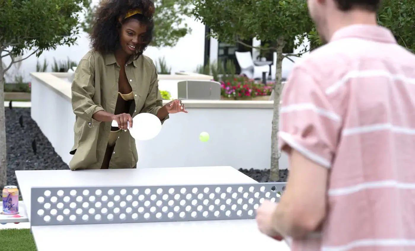 Perfect for your backyard, deck, or patio, this premium table tennis set comes complete with a durable net, two paddles, and four balls, so you can start playing the moment it’s set up.