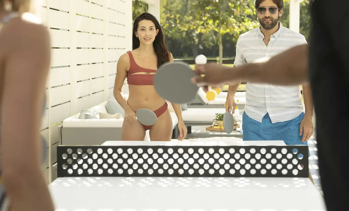 Perfect for your backyard, deck, or patio, this premium table tennis set comes complete with a durable net, two paddles, and four balls, so you can start playing the moment it’s set up.