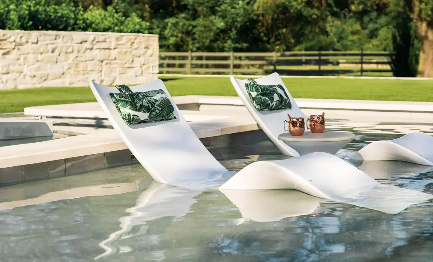 Ledge Lounger Autograph Chaise is designed for use on your pool’s tanning ledge, baja shelf, or sun shelf with water depths of 0-9 inches, this chaise blends architectural elegance with cutting-edge ergonomics, offering best-in-class lumbar, head, and nec