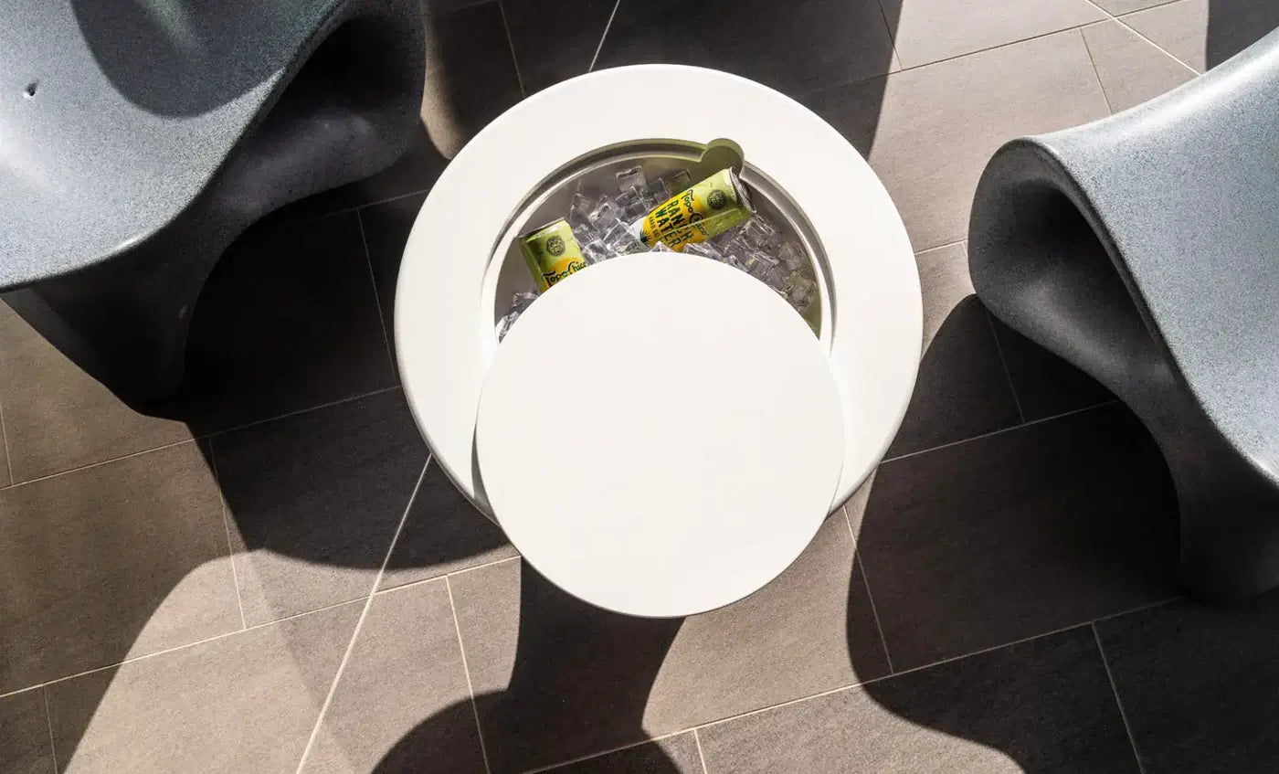 Its integrated ice bin holds up to 12 cans of your favorite beverages, keeping them chilled and ready, while also offering wet and dry storage for poolside essentials like sunscreen or phones, all protected by a sturdy, splash-resistant lid.