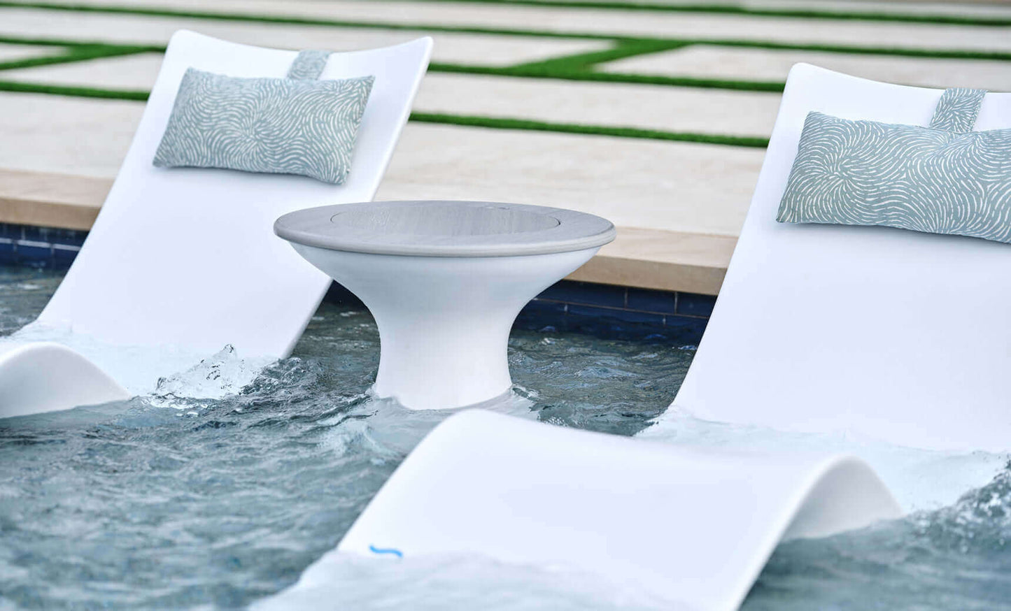 Ledge Lounger Autograph Chaise is designed for use on your pool’s tanning ledge, baja shelf, or sun shelf with water depths of 0-9 inches, this chaise blends architectural elegance with cutting-edge ergonomics, offering best-in-class lumbar, head, and nec
