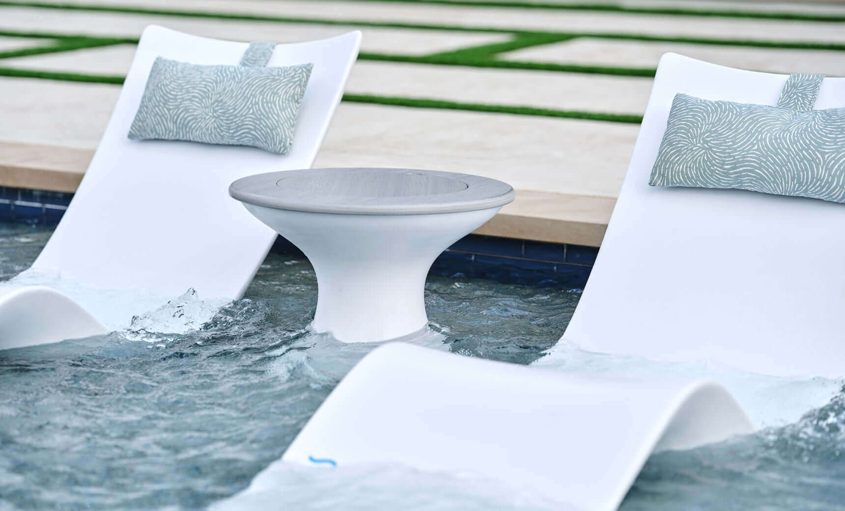 Ledge Lounger Autograph Chaise is designed for use on your pool’s tanning ledge, baja shelf, or sun shelf with water depths of 0-9 inches, this chaise blends architectural elegance with cutting-edge ergonomics, offering best-in-class lumbar, head, and nec