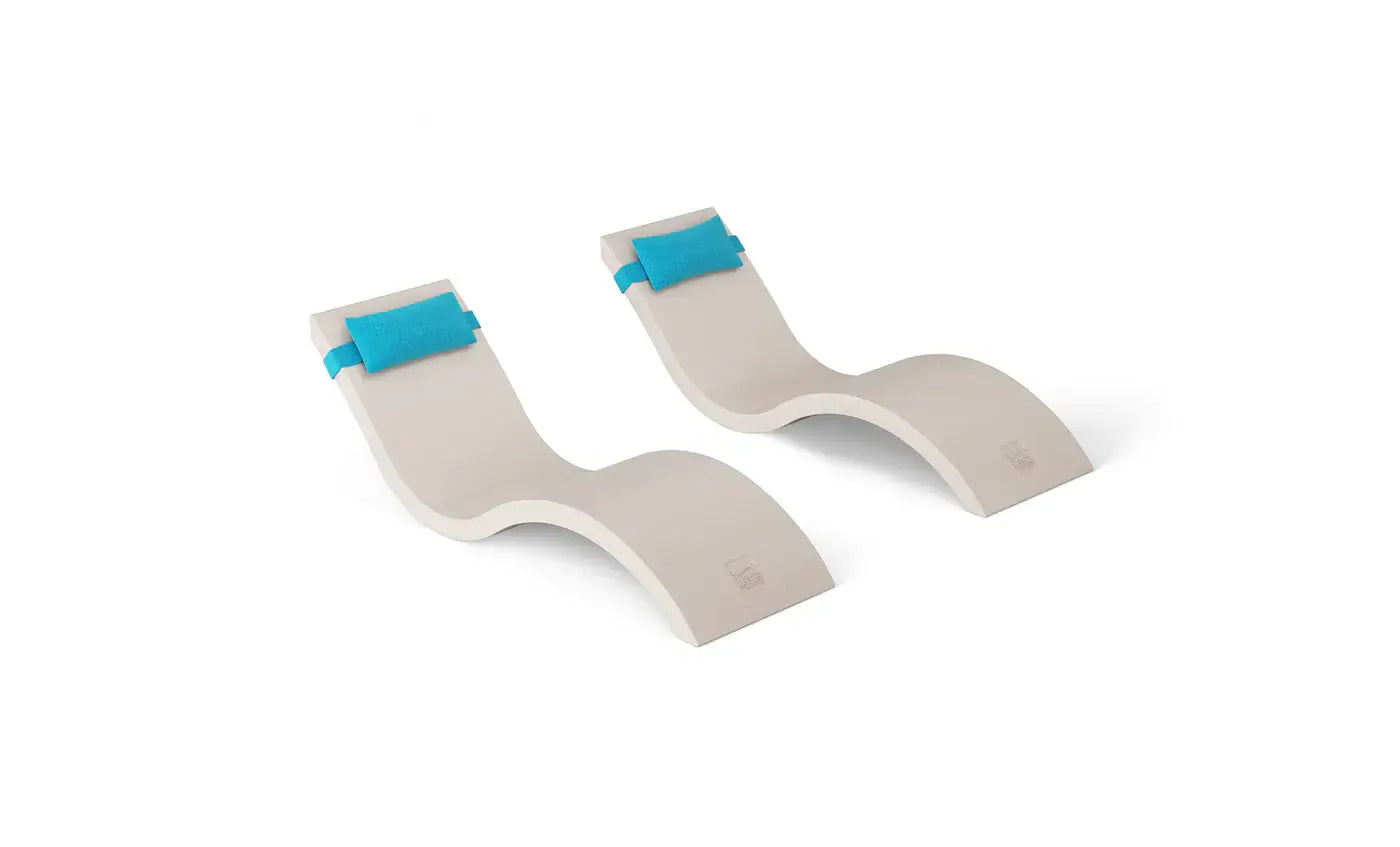 This luxurious set includes two Signature In-Pool Chaise Loungers and two matching Headrest Pillows, designed for ultimate comfort on your pool’s tanning ledge, baja shelf, or sun shelf with water depths of 0-9 inches.