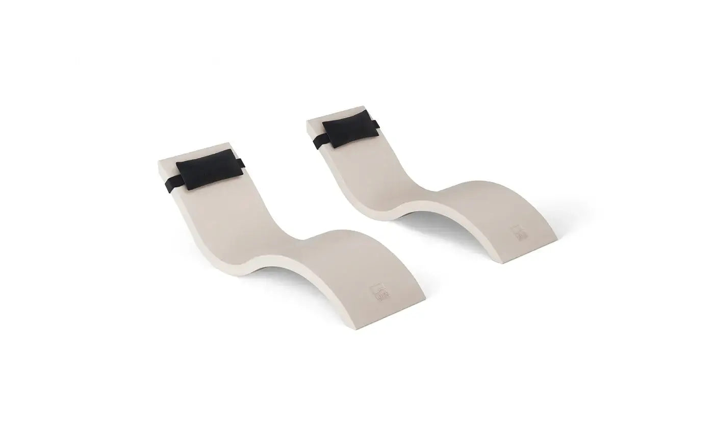 This luxurious set includes two Signature In-Pool Chaise Loungers and two matching Headrest Pillows, designed for ultimate comfort on your pool’s tanning ledge, baja shelf, or sun shelf with water depths of 0-9 inches.