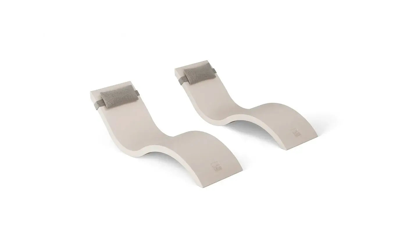 This luxurious set includes two Signature In-Pool Chaise Loungers and two matching Headrest Pillows, designed for ultimate comfort on your pool’s tanning ledge, baja shelf, or sun shelf with water depths of 0-9 inches.