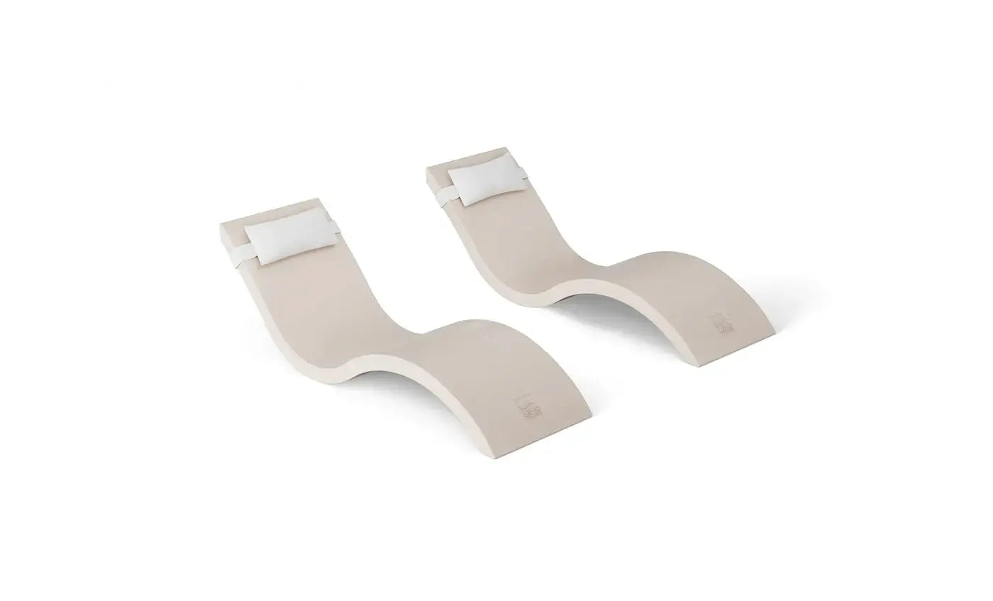 This luxurious set includes two Signature In-Pool Chaise Loungers and two matching Headrest Pillows, designed for ultimate comfort on your pool’s tanning ledge, baja shelf, or sun shelf with water depths of 0-9 inches.