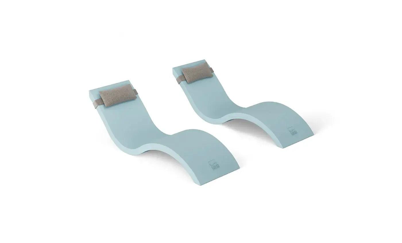This luxurious set includes two Signature In-Pool Chaise Loungers and two matching Headrest Pillows, designed for ultimate comfort on your pool’s tanning ledge, baja shelf, or sun shelf with water depths of 0-9 inches.