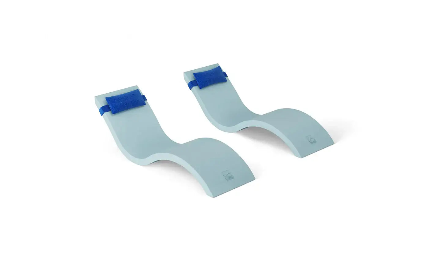 This luxurious set includes two Signature In-Pool Chaise Loungers and two matching Headrest Pillows, designed for ultimate comfort on your pool’s tanning ledge, baja shelf, or sun shelf with water depths of 0-9 inches.