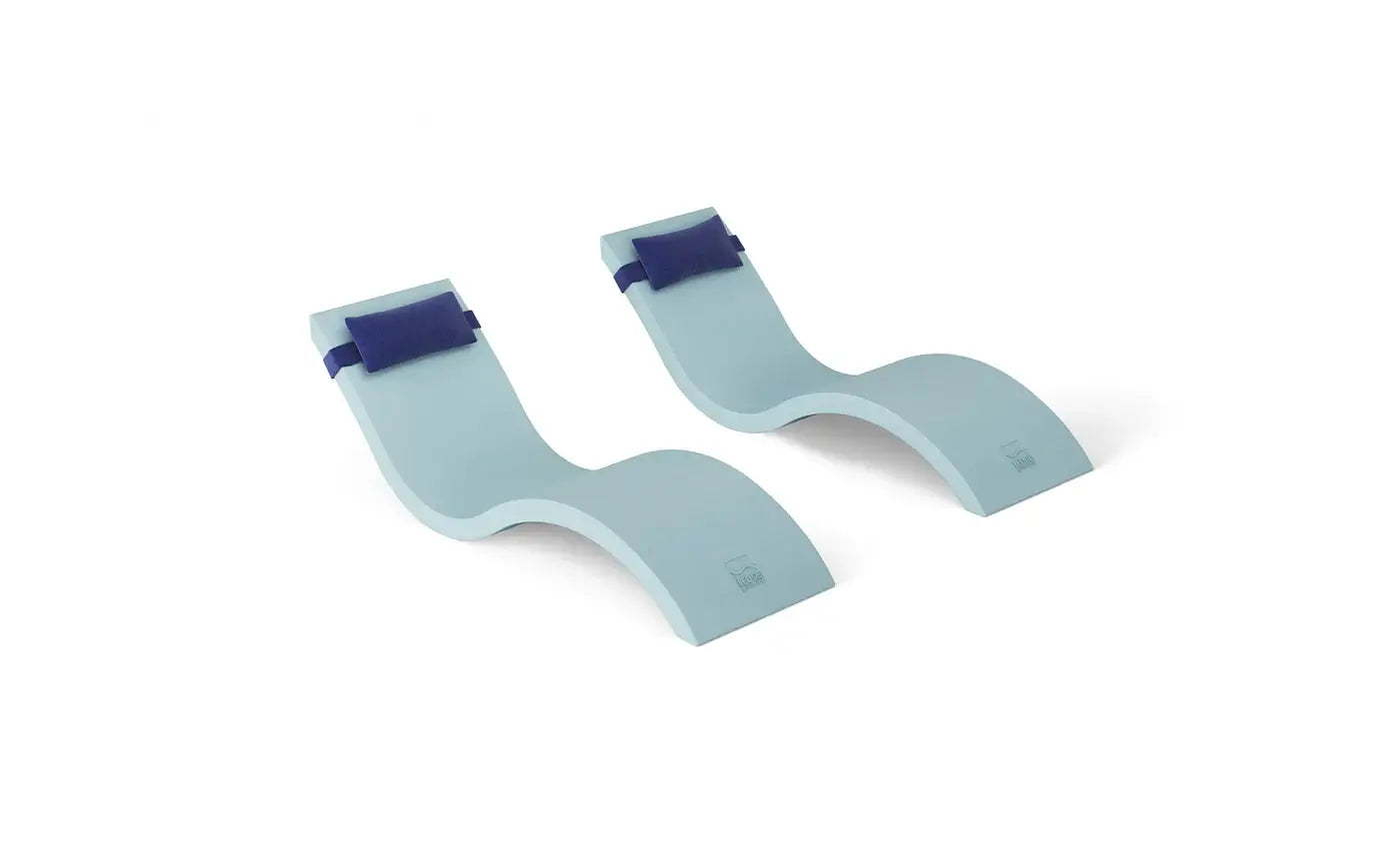 This luxurious set includes two Signature In-Pool Chaise Loungers and two matching Headrest Pillows, designed for ultimate comfort on your pool’s tanning ledge, baja shelf, or sun shelf with water depths of 0-9 inches.