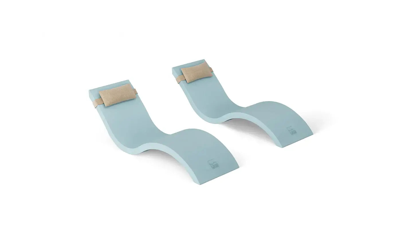 This luxurious set includes two Signature In-Pool Chaise Loungers and two matching Headrest Pillows, designed for ultimate comfort on your pool’s tanning ledge, baja shelf, or sun shelf with water depths of 0-9 inches.