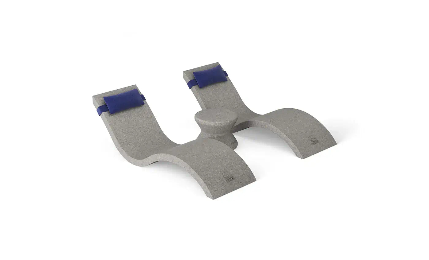 Designed for tanning ledges, baja shelves, or sun shelves with water depths up to 9 inches, this set includes two Signature In-Pool Chaise Loungers, two plush Headrest Pillows, and a versatile Side Table.
