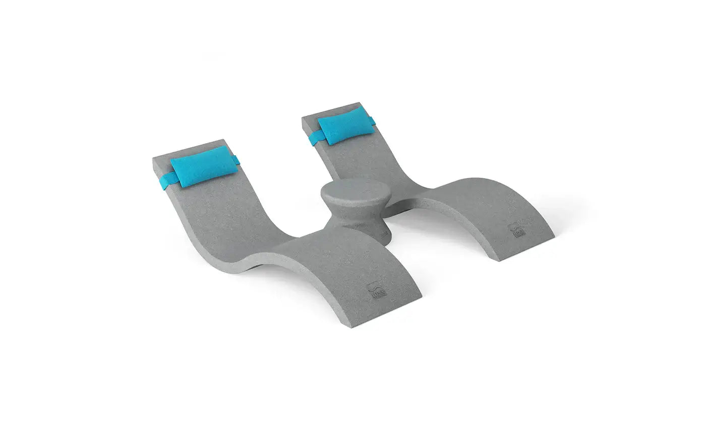 Designed for tanning ledges, baja shelves, or sun shelves with water depths up to 9 inches, this set includes two Signature In-Pool Chaise Loungers, two plush Headrest Pillows, and a versatile Side Table.