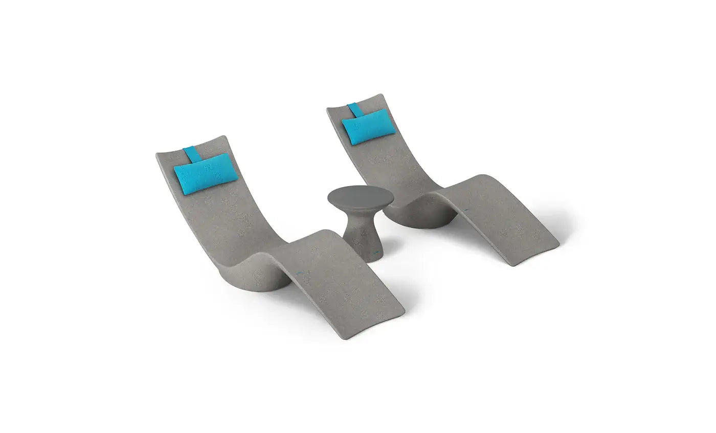 This premium set includes two Autograph In-Pool Chaise Loungers, two plush Headrest Pillows, and a sleek Autograph Standard Side Table, offering everything you need to create a sophisticated outdoor oasis.