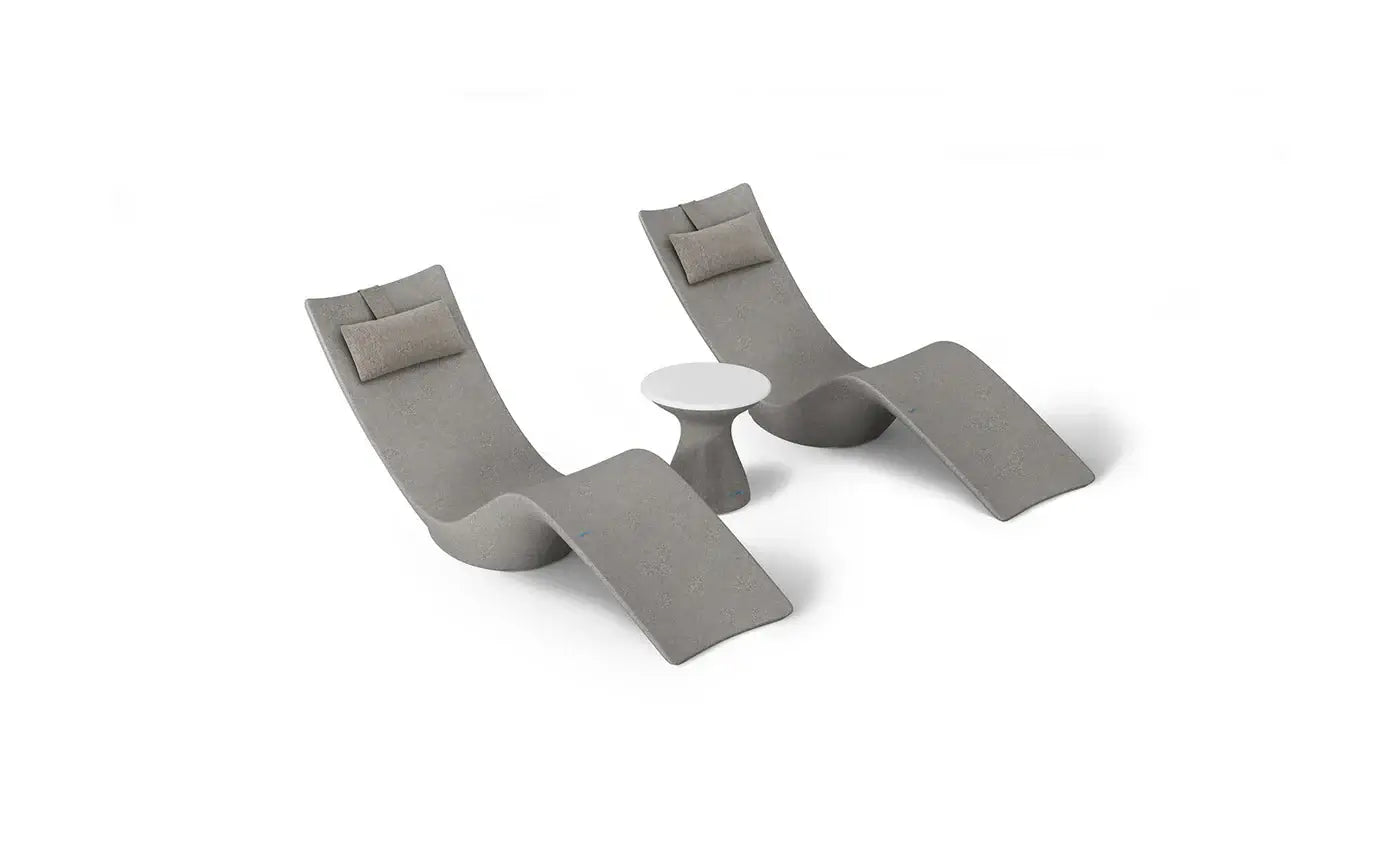 This premium set includes two Autograph In-Pool Chaise Loungers, two plush Headrest Pillows, and a sleek Autograph Standard Side Table, offering everything you need to create a sophisticated outdoor oasis.