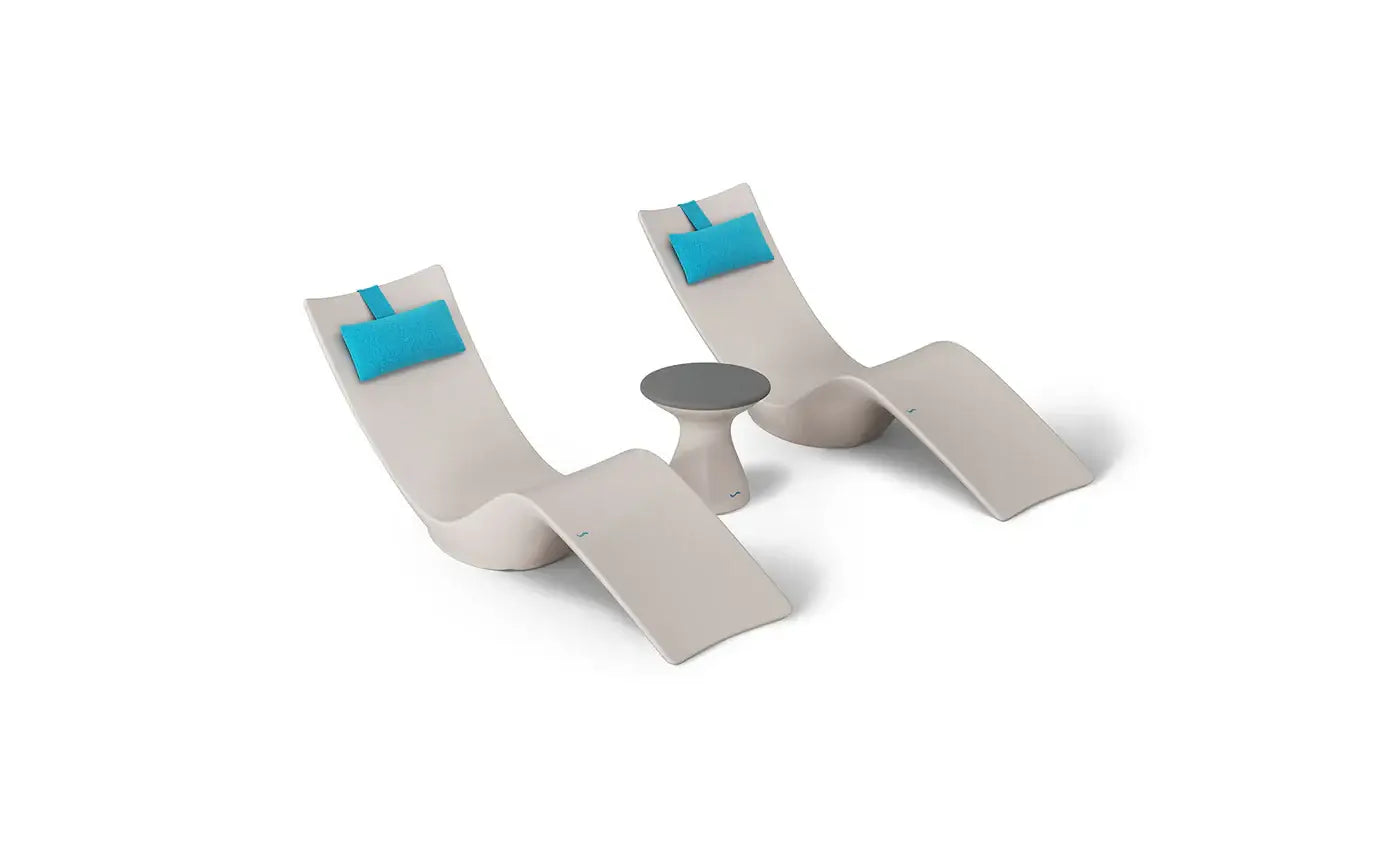This premium set includes two Autograph In-Pool Chaise Loungers, two plush Headrest Pillows, and a sleek Autograph Standard Side Table, offering everything you need to create a sophisticated outdoor oasis.