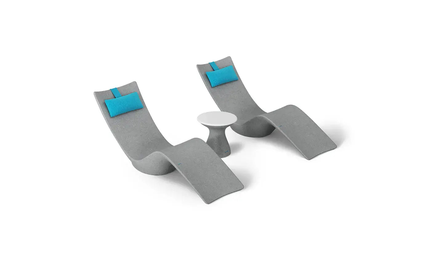 This premium set includes two Autograph In-Pool Chaise Loungers, two plush Headrest Pillows, and a sleek Autograph Standard Side Table, offering everything you need to create a sophisticated outdoor oasis.