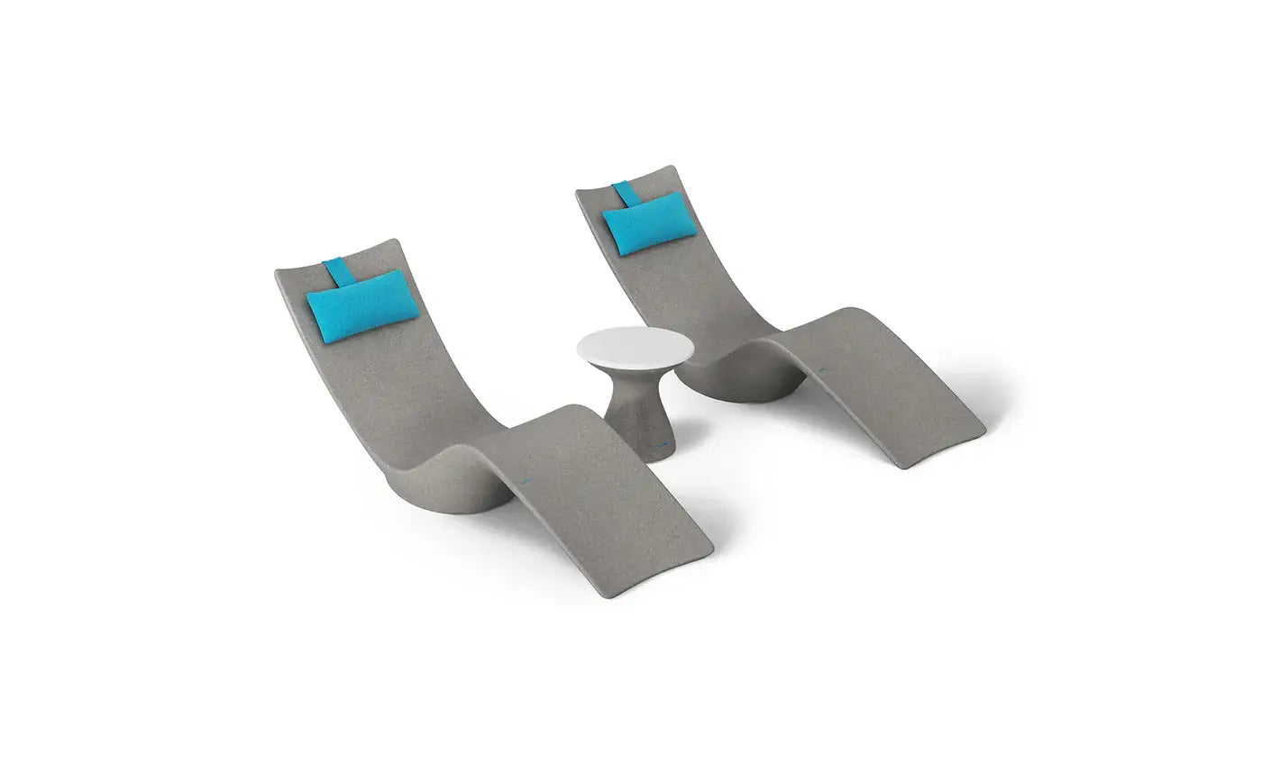 This premium set includes two Autograph In-Pool Chaise Loungers, two plush Headrest Pillows, and a sleek Autograph Standard Side Table, offering everything you need to create a sophisticated outdoor oasis.