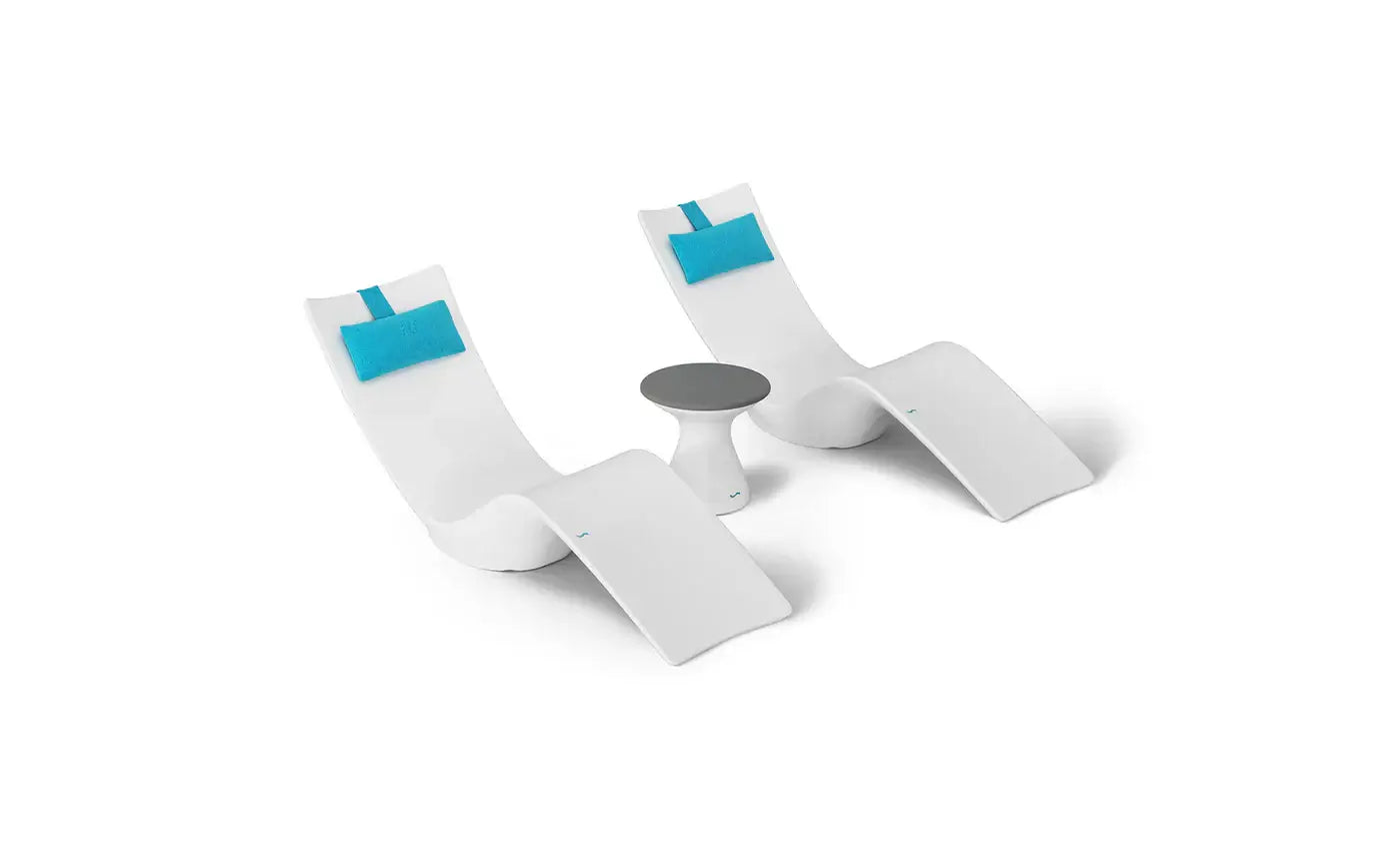 This premium set includes two Autograph In-Pool Chaise Loungers, two plush Headrest Pillows, and a sleek Autograph Standard Side Table, offering everything you need to create a sophisticated outdoor oasis.