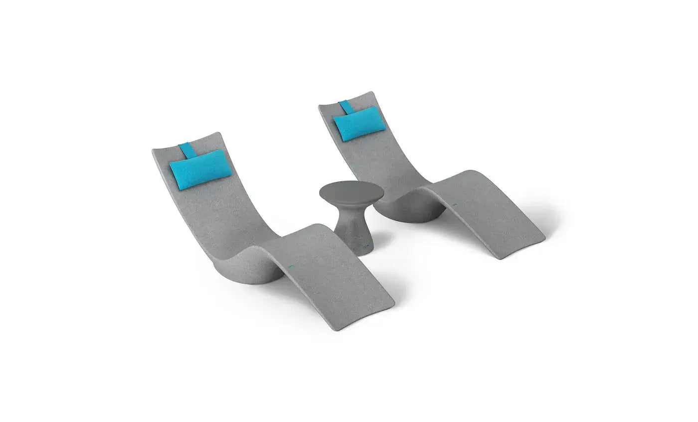 This premium set includes two Autograph In-Pool Chaise Loungers, two plush Headrest Pillows, and a sleek Autograph Standard Side Table, offering everything you need to create a sophisticated outdoor oasis.