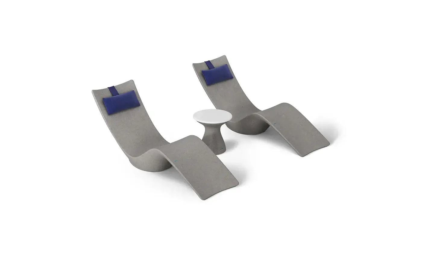 This premium set includes two Autograph In-Pool Chaise Loungers, two plush Headrest Pillows, and a sleek Autograph Standard Side Table, offering everything you need to create a sophisticated outdoor oasis.