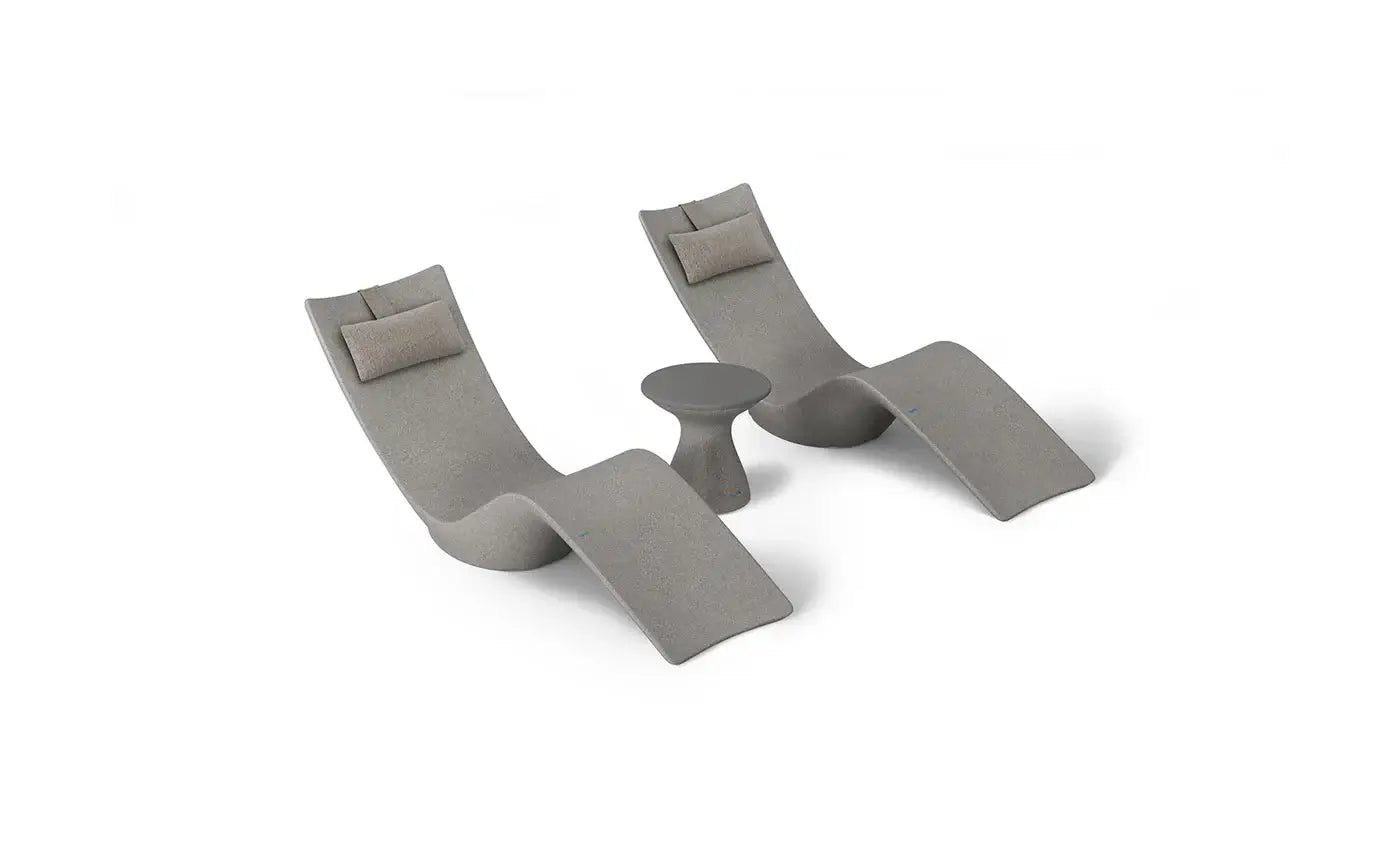 This premium set includes two Autograph In-Pool Chaise Loungers, two plush Headrest Pillows, and a sleek Autograph Standard Side Table, offering everything you need to create a sophisticated outdoor oasis.