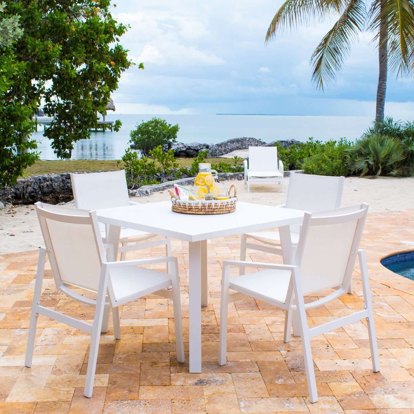 Panama Jack 5-piece square outdoor dining set made with strong powder-coated finish resistant to corroding and scratching