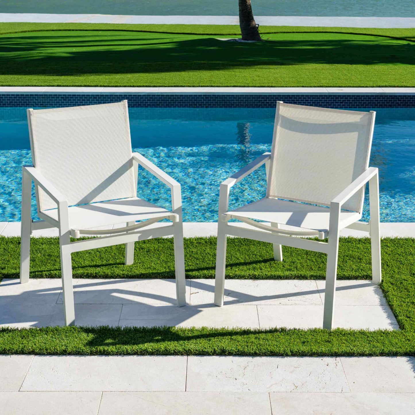 Panama Jack outdoor stackable armchairs set of 2 made with strong powder-coated finish resistant to corroding and scratching