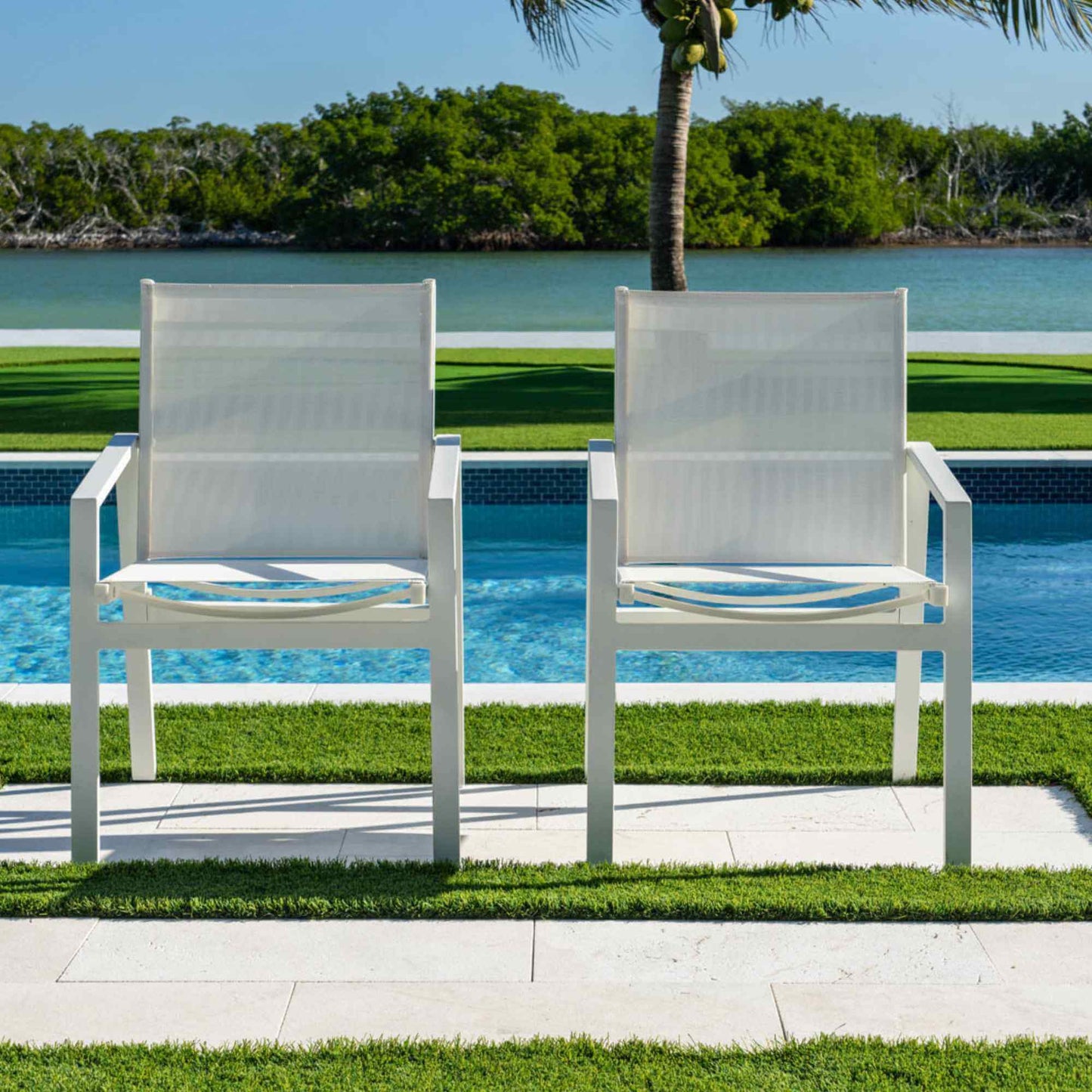 Panama Jack outdoor stackable armchairs set of 2 made with strong powder-coated finish resistant to corroding and scratching