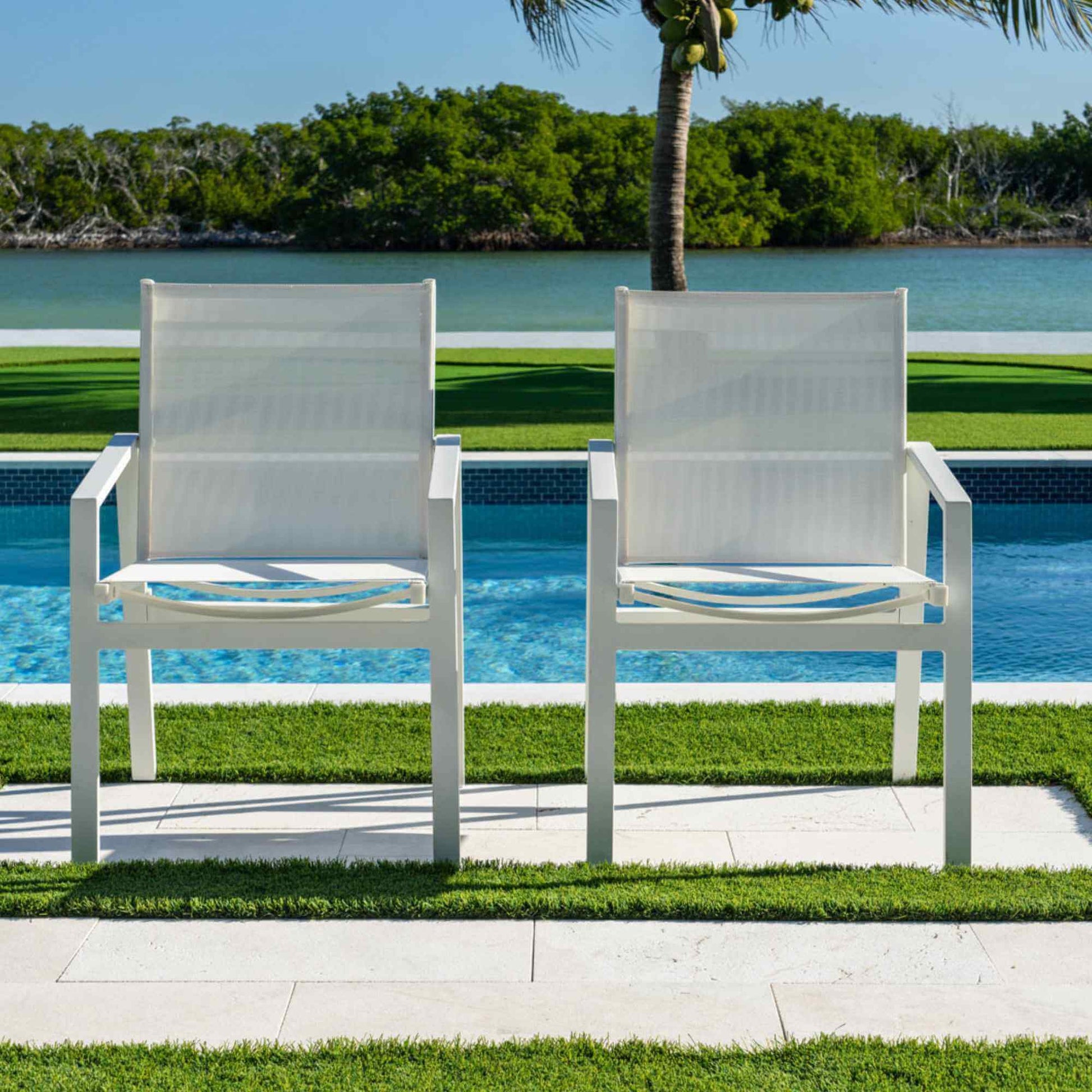 Panama Jack outdoor stackable armchairs set of 2 made with strong powder-coated finish resistant to corroding and scratching