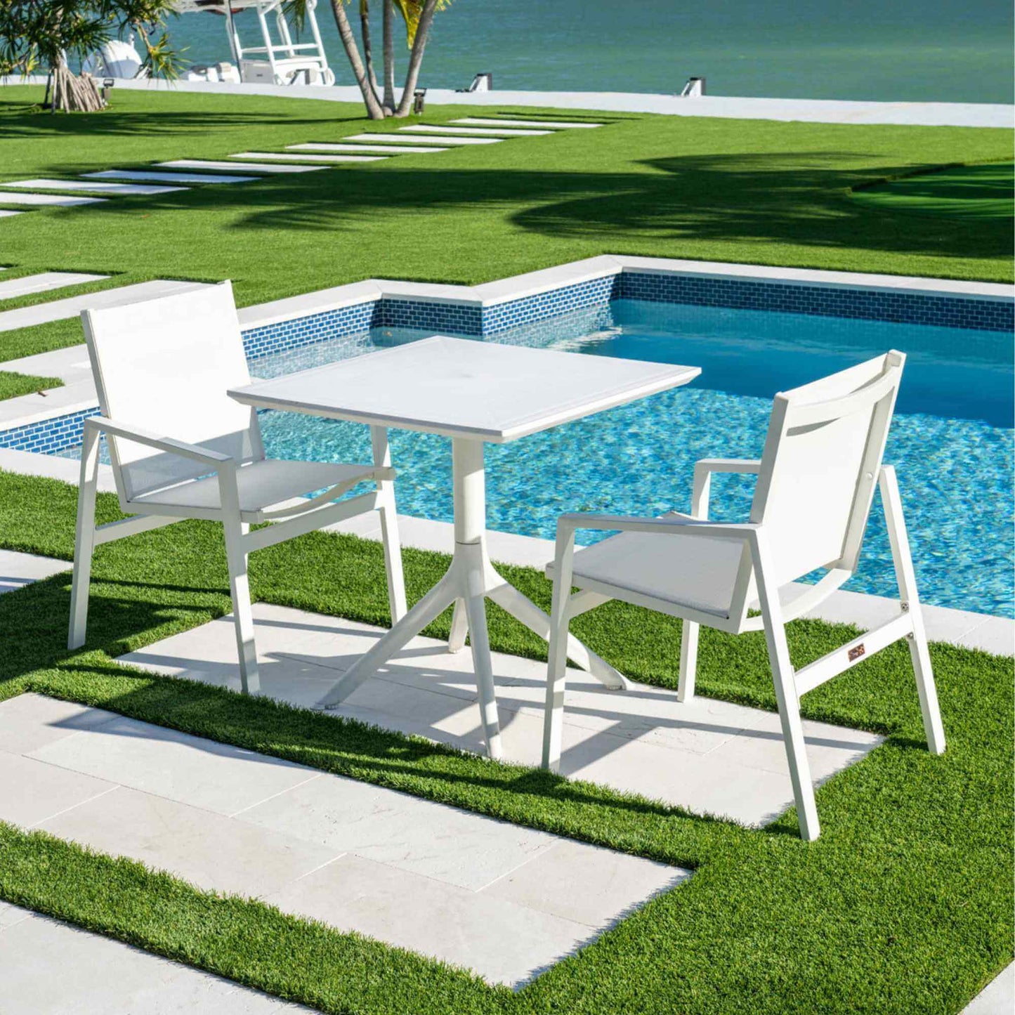 Panama Jack outdoor stackable armchairs set of 2 made with strong powder-coated finish resistant to corroding and scratching