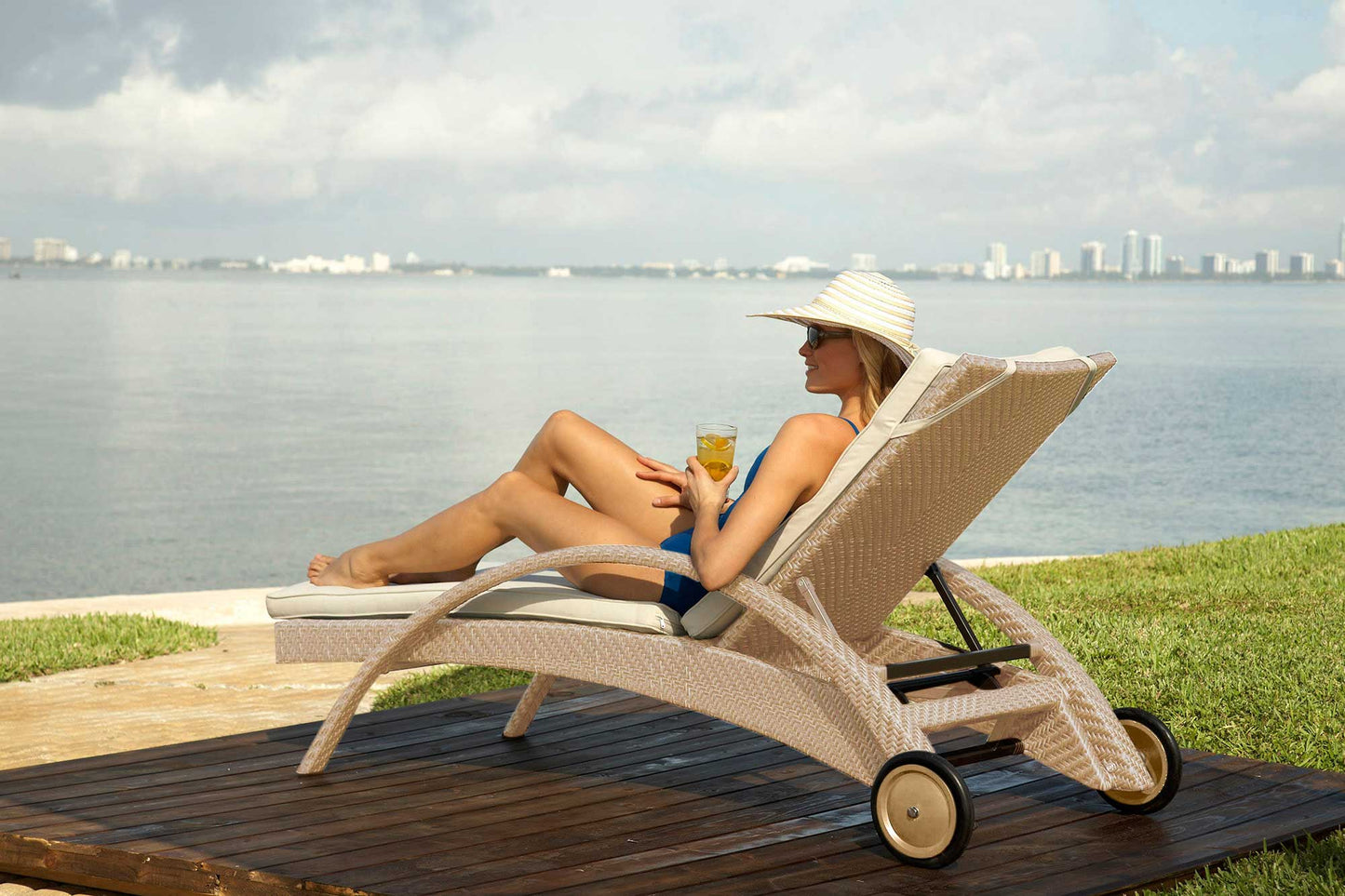 Panama Jack outdoor chaise lounge crafted with aluminum frames and commercial quality fiber weaving with cushion