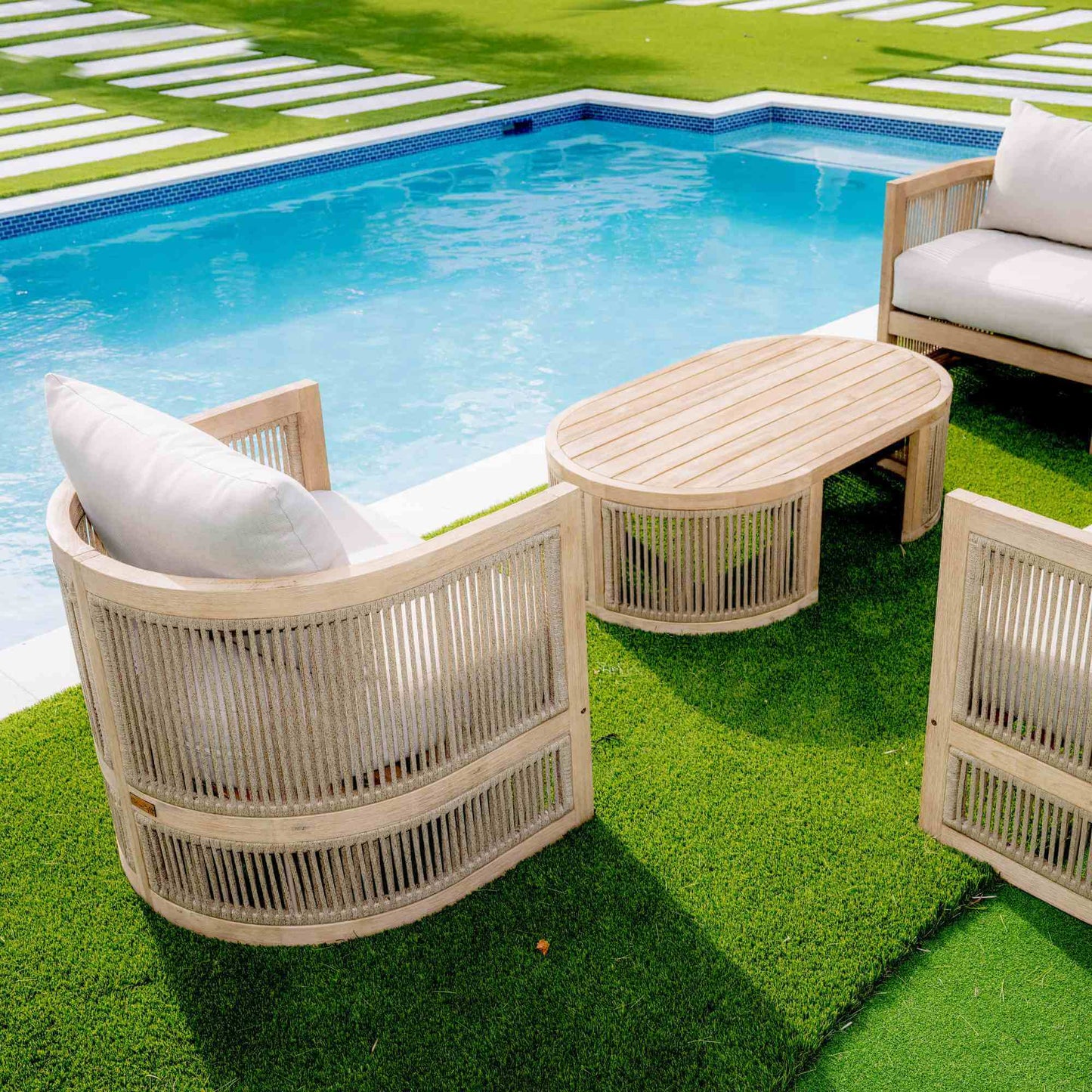 Panama Jack 4-piece outdoor loveseat seating set made with Acacia wood for a natural wood finish with outdoor cushions