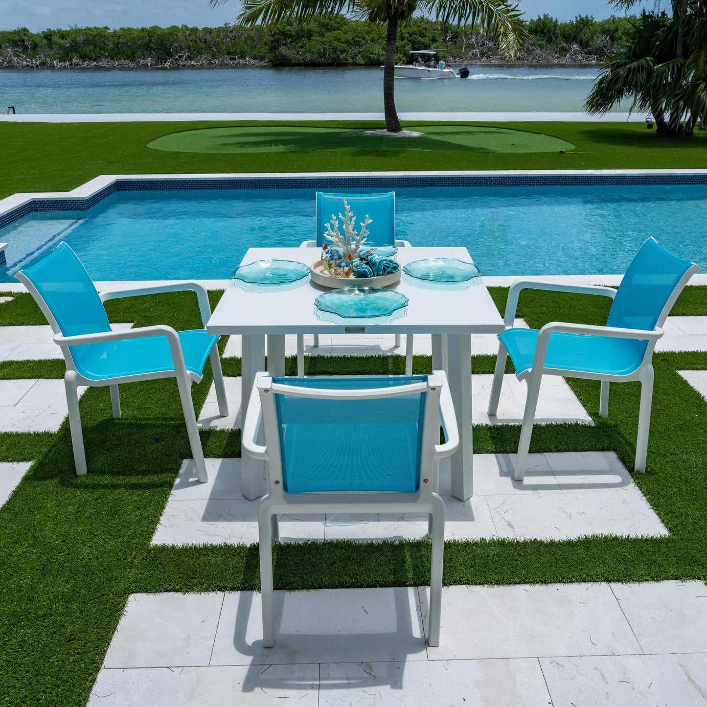 Panama Jack 5-piece outdoor dining set with stackable chairs and glass top included