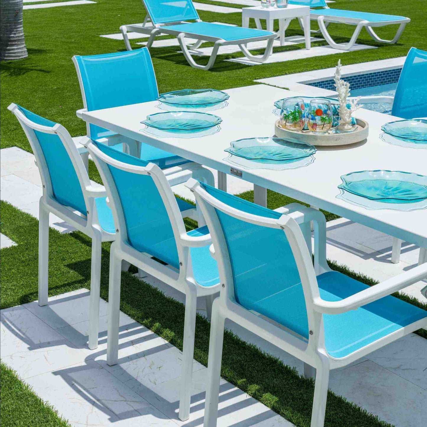 Panama Jack 9-piece outdoor dining set with stackable chairs and glass top included