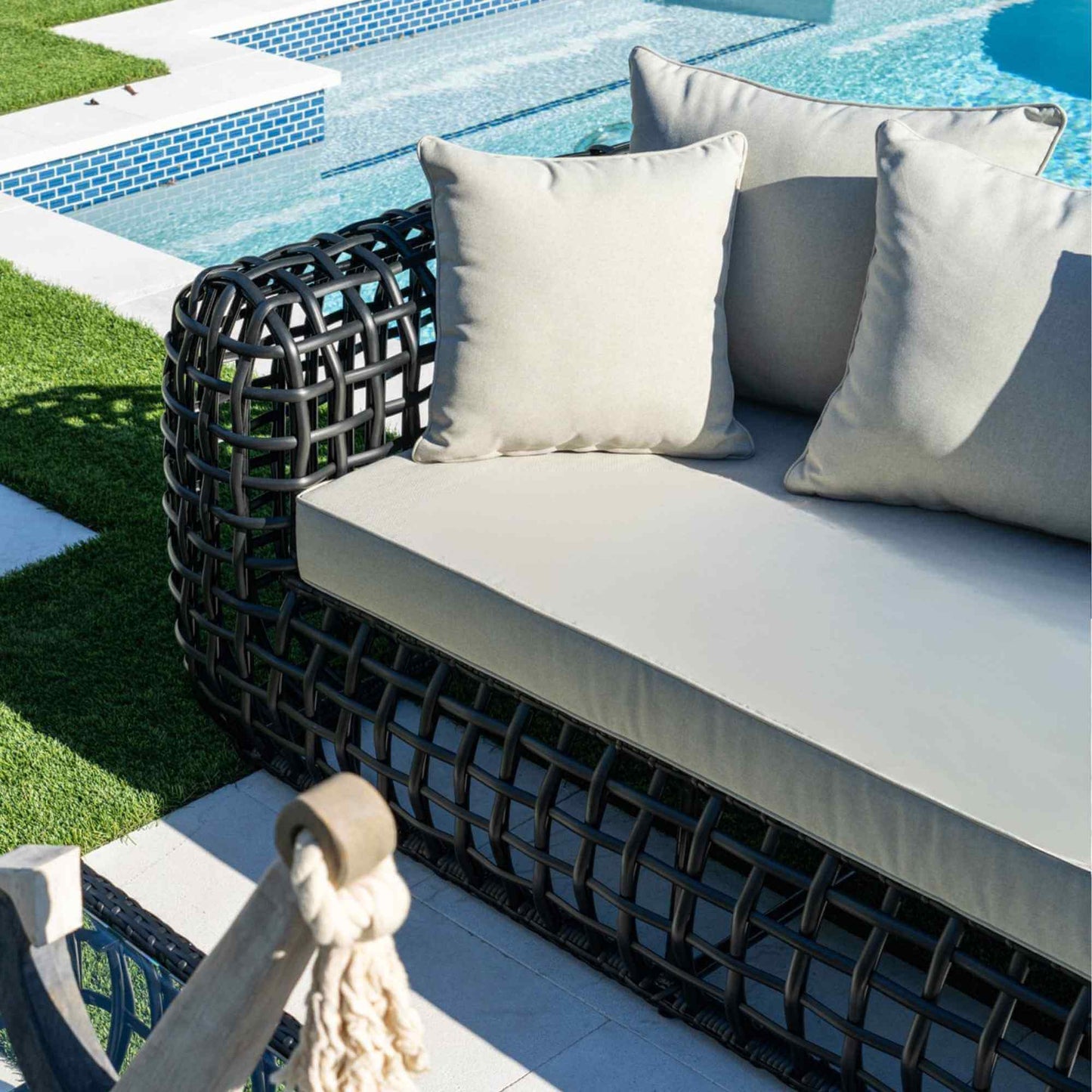 Black synthetic wicker outdoor sofa
