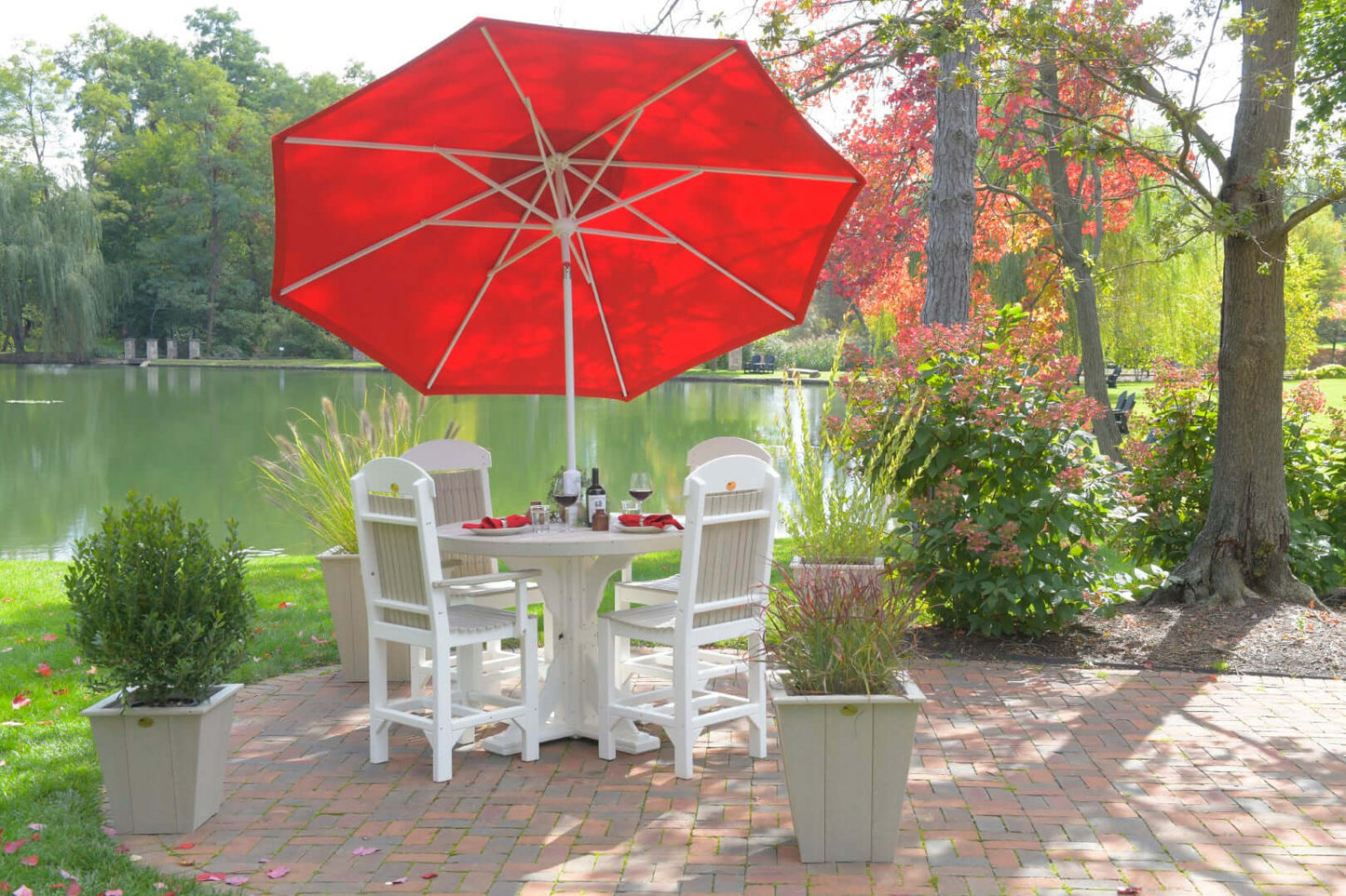 LuxCraft round outdoor dining table 5-piece set includes 1 round dining table and 4 adirondack dining side chairs