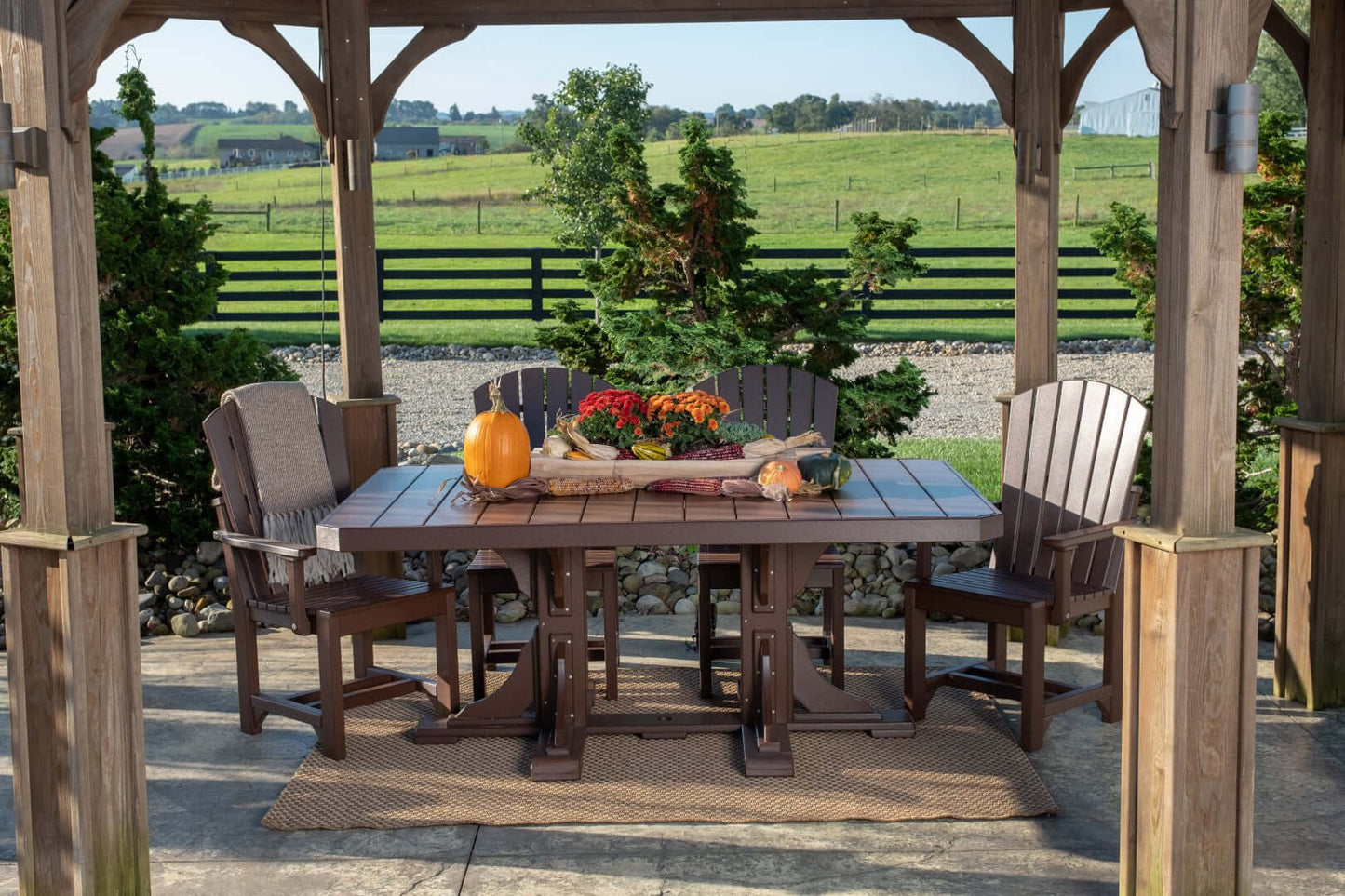 LuxCraft 6-foot rectangular Outdoor Dining Table features umbrella hole for added shade and variety of color options