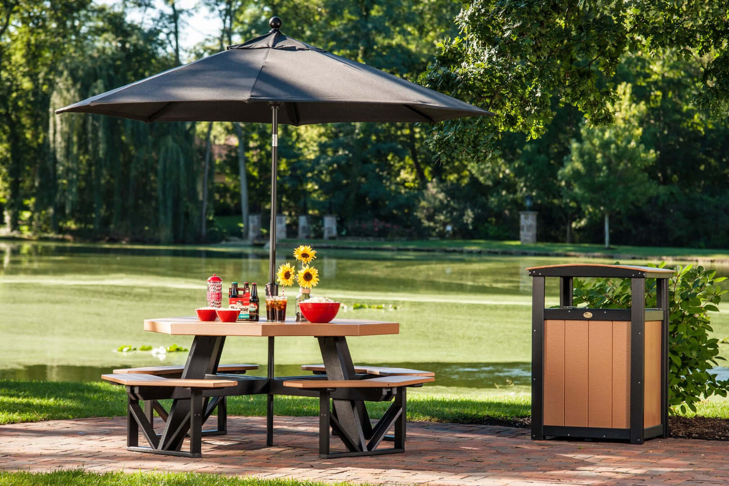 LuxCraft Octagon Outdoor Picnic Table designed to seat eight with standard umbrella hole