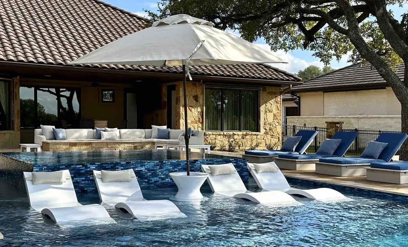 Ledge Lounger Signature Tall Ice Bin Side Table is designed for in-pool use on baja shelves or sun ledges with water depths up to 15 inches, or as a chic addition to your deck, this versatile table keeps your favorite beverages chilled and close at hand.