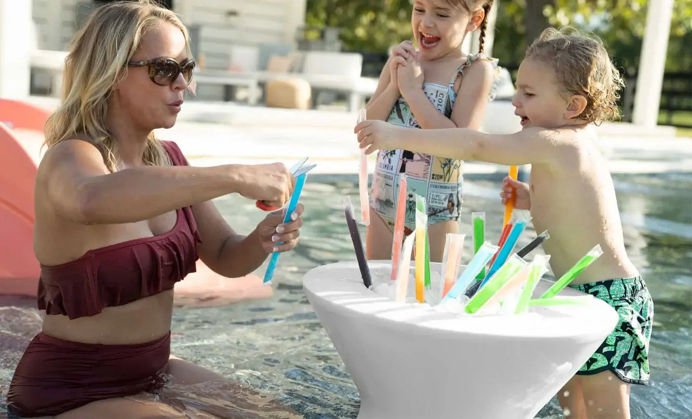 Ledge Lounger Signature Tall Ice Bin Side Table is designed for in-pool use on baja shelves or sun ledges with water depths up to 15 inches, or as a chic addition to your deck, this versatile table keeps your favorite beverages chilled and close at hand.