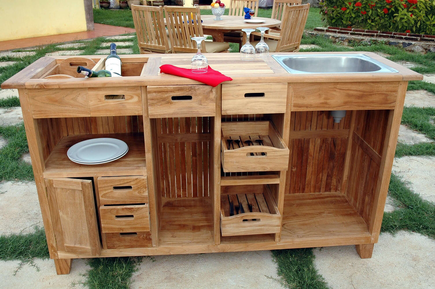 Anderson Teak Outdoor Bar Table Equipped with 7 drawers and 1 cabinet, wine glass hangers, removable ice bucket and integrated aluminum sink
