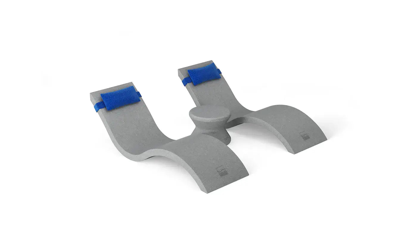 Designed for tanning ledges, baja shelves, or sun shelves with water depths up to 9 inches, this set includes two Signature In-Pool Chaise Loungers, two plush Headrest Pillows, and a versatile Side Table.