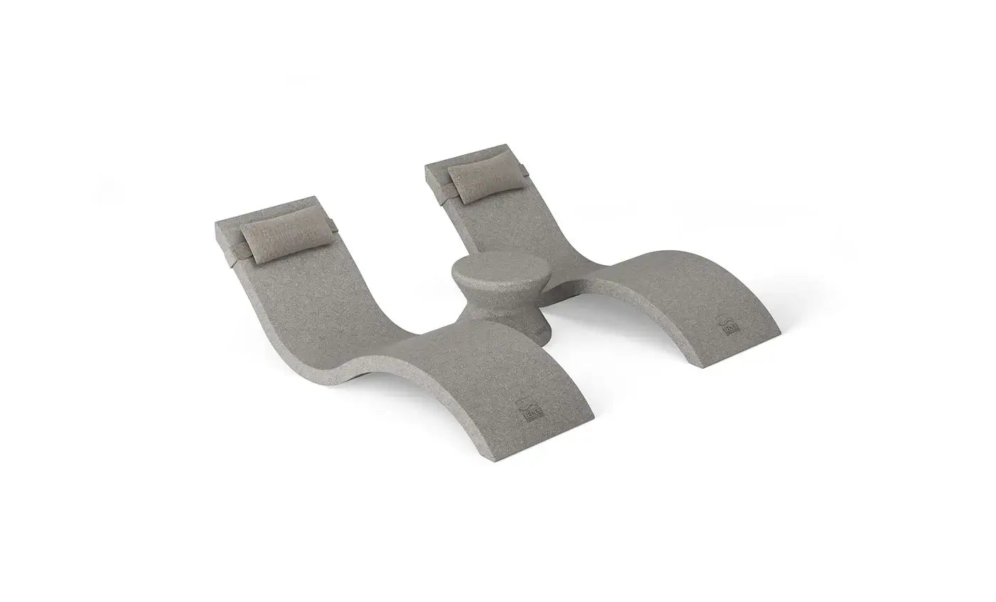 Designed for tanning ledges, baja shelves, or sun shelves with water depths up to 9 inches, this set includes two Signature In-Pool Chaise Loungers, two plush Headrest Pillows, and a versatile Side Table.